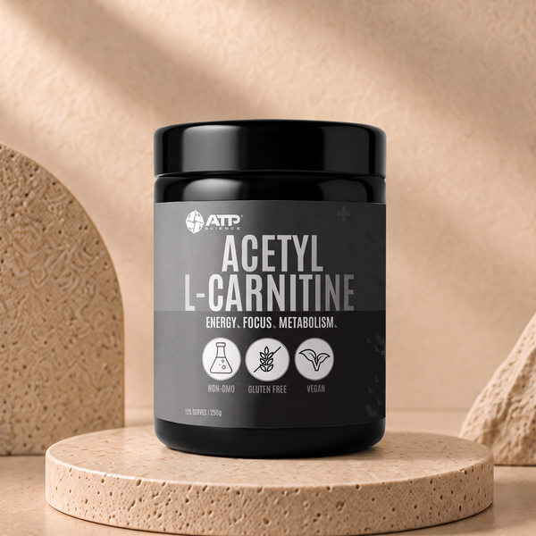 ATP Science Acetyl L-Carnitine 250g on a warm stone platform
