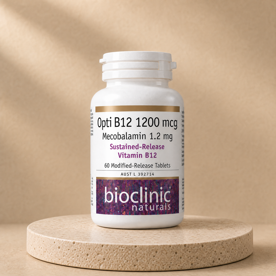 Bioclinic Naturals Opti B12 1200 mcg, mecobalamin 1.2 mg, 60 modified-release tablets on a beige stone platform