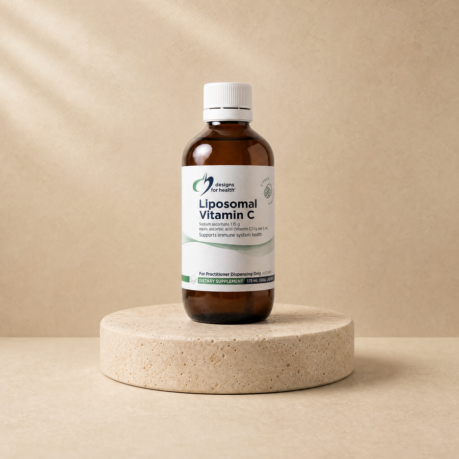 Liposomal vitamin C on a beige stone platform