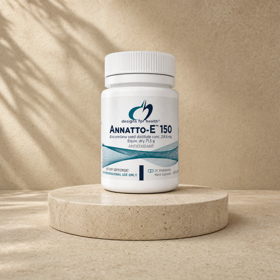 Designs for Health Annatto-E 150, 30 vegetarian hard capsules, 214.6 mg/71.5 g on a beige stone platform