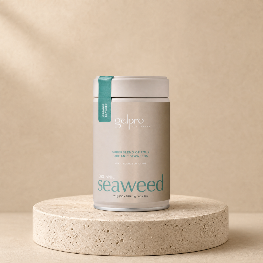 Organic seaweed mineral blend on a beige stone platform