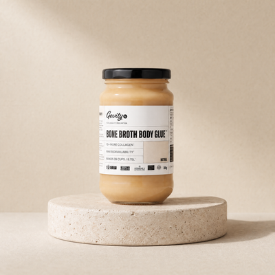 Concentrated bone broth (natural flavor) on a beige stone platform
