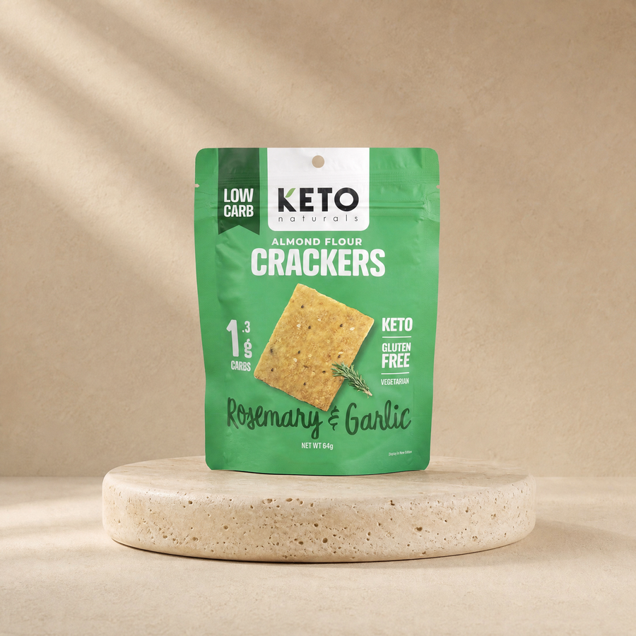 Almond flour crackers (rosemary and garlic) on a beige stone platform