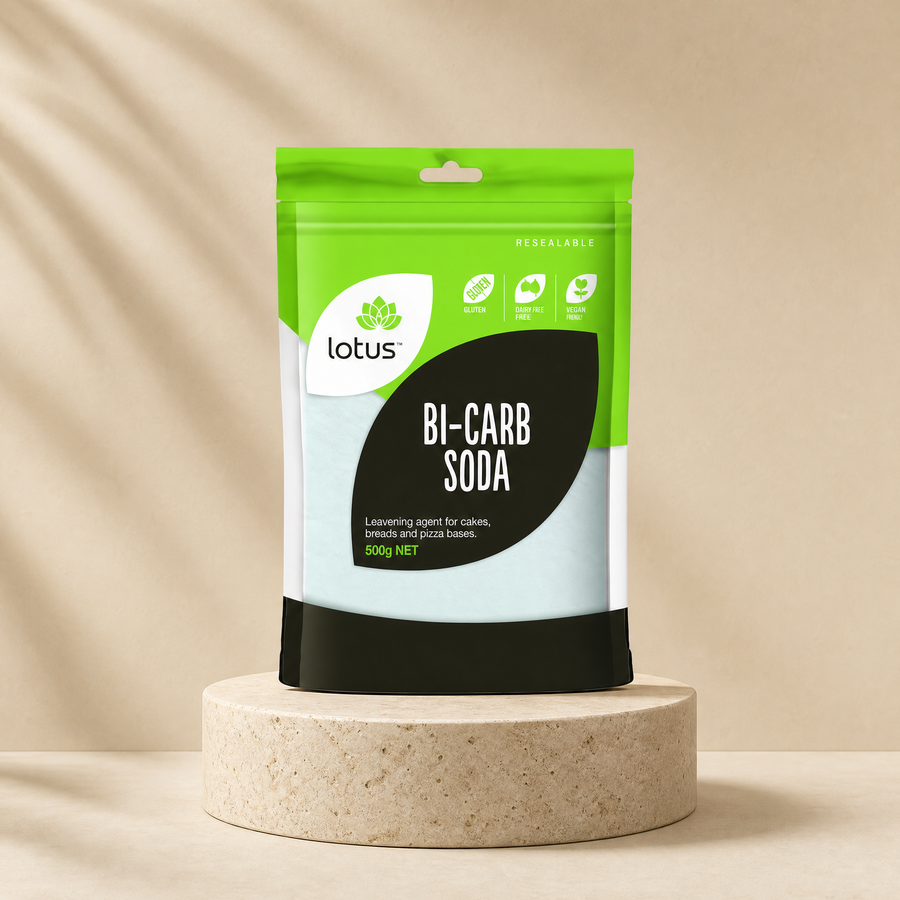 Lotus Bi-Carb Soda, 500 g net; front label, colour and pouch proportions match source on a beige stone platform