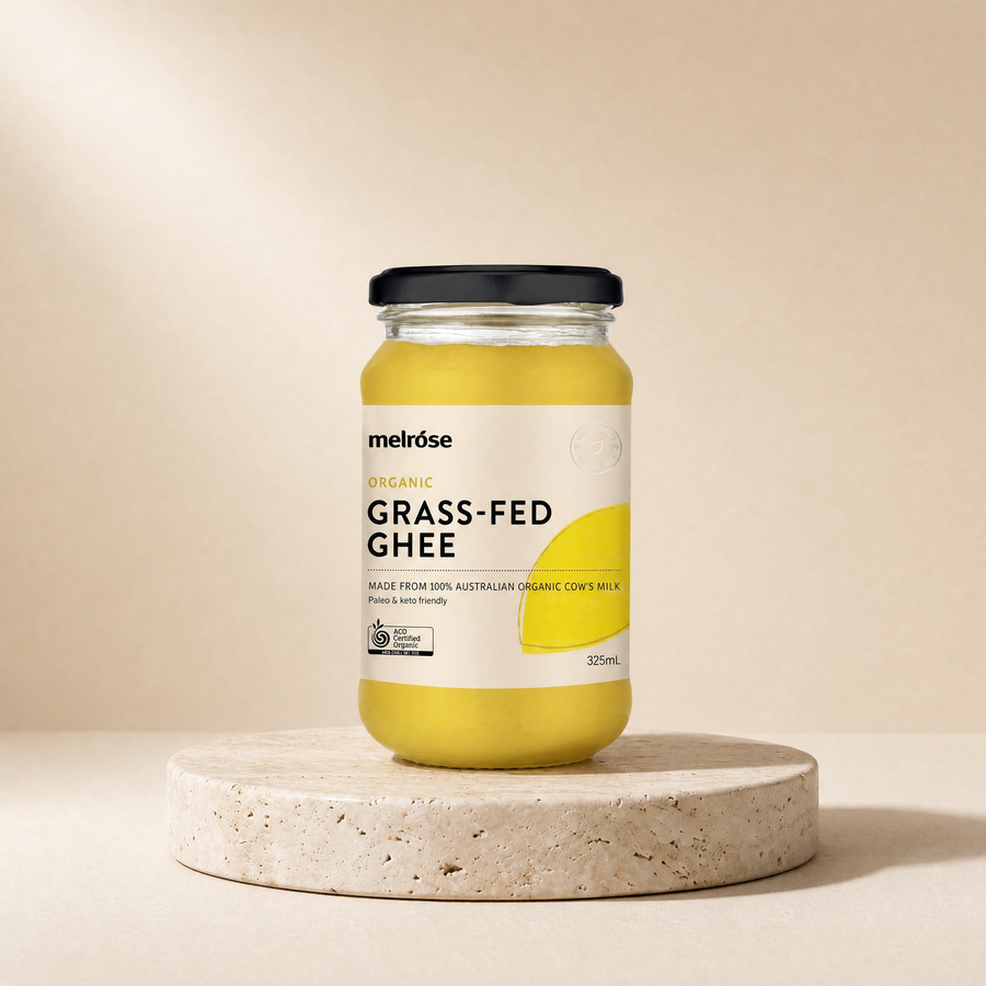 Melrose Organic Grass-Fed Ghee, 325 mL on a beige stone platform