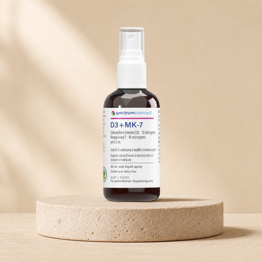 Spectrumceuticals D3 + MK-7, D3 25 micrograms/K2 45 micrograms per 0.2 mL, 50 mL oral liquid spray on a beige stone platform